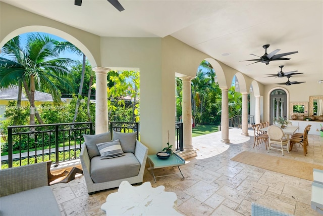 view of patio / terrace featuring ceiling fan