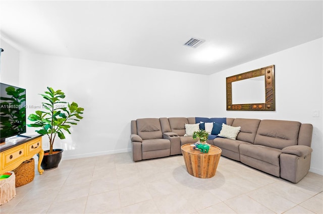 living room with light tile patterned floors