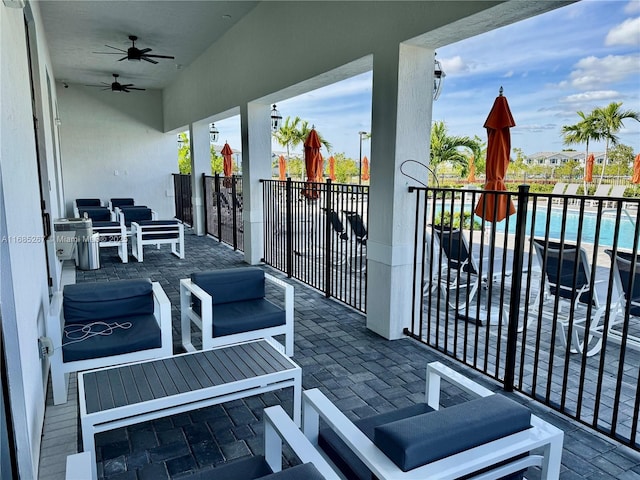 balcony featuring ceiling fan