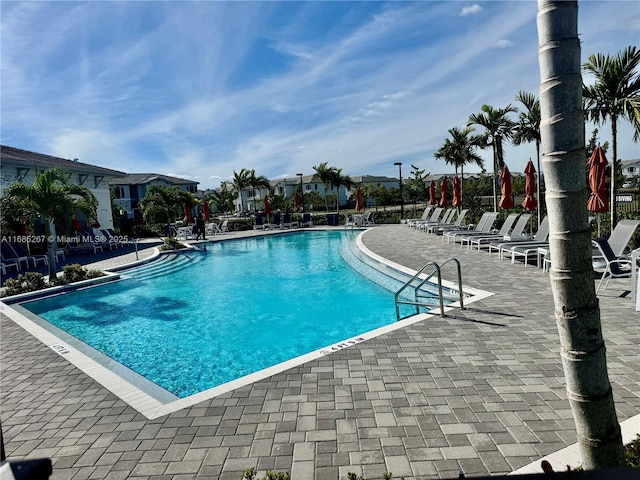 view of pool featuring a patio area