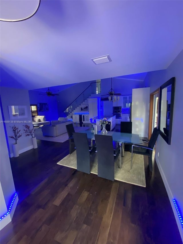 dining room with hardwood / wood-style flooring and ceiling fan