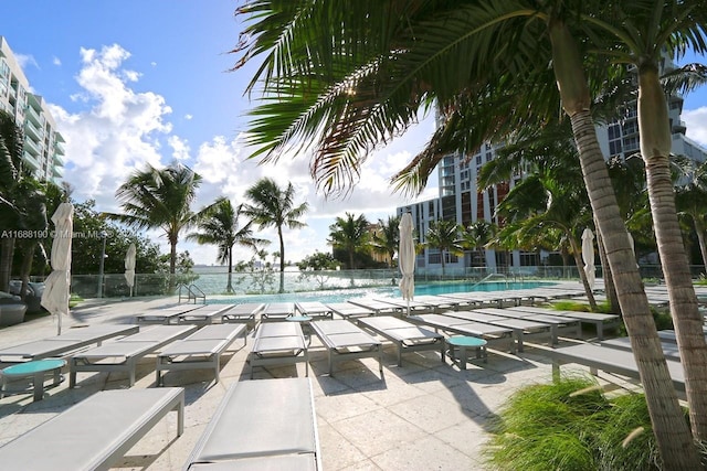 view of swimming pool with a patio