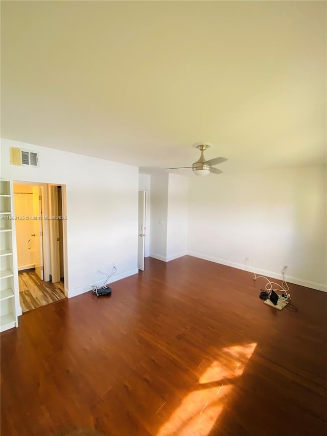 unfurnished room with wood-type flooring and ceiling fan