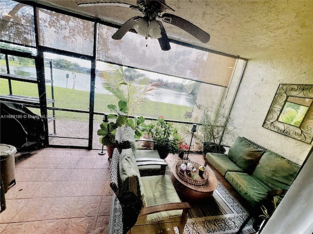 sunroom / solarium with ceiling fan