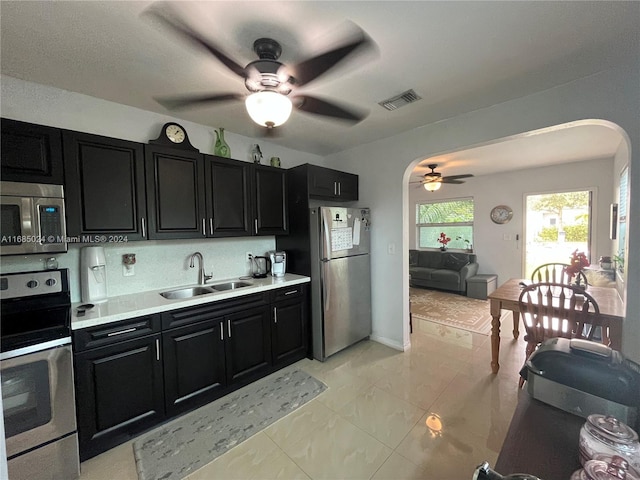 kitchen with sink and appliances with stainless steel finishes