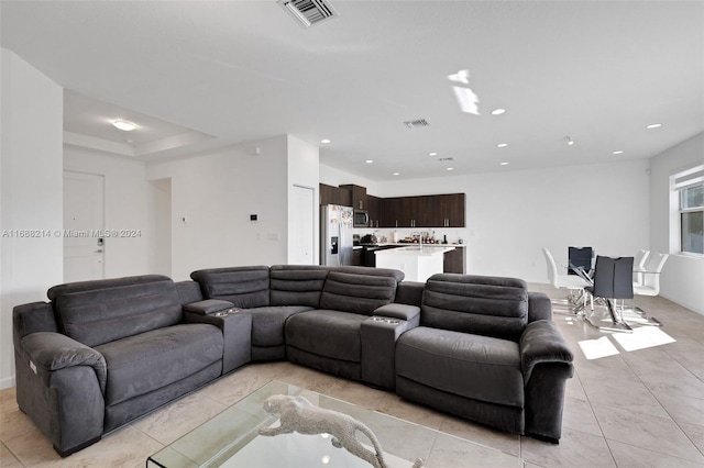 living room featuring light tile patterned floors