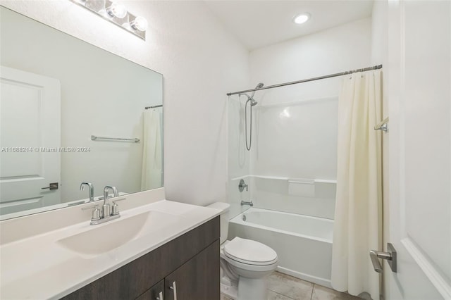 full bathroom with tile patterned flooring, vanity, toilet, and shower / tub combo with curtain