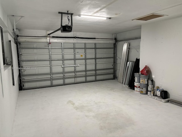 garage featuring a garage door opener