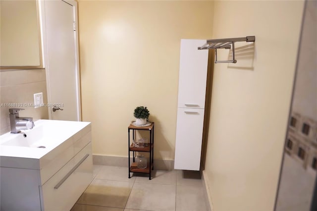 bathroom with vanity and tile patterned floors