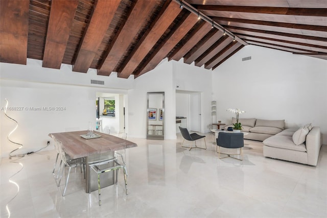 interior space with high vaulted ceiling, wood ceiling, and beam ceiling