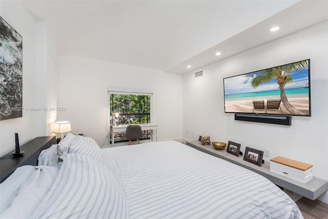 bedroom featuring wood-type flooring