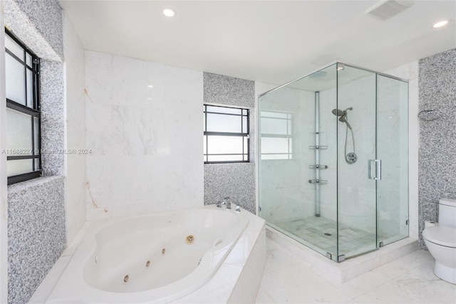 bathroom with shower with separate bathtub and toilet