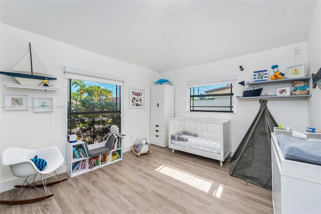 bedroom featuring light hardwood / wood-style floors