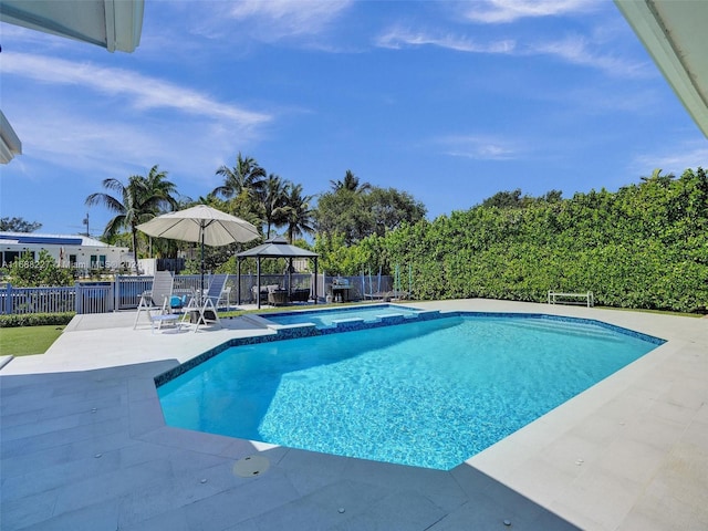 view of pool featuring a gazebo and a patio area