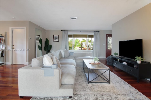 living room featuring dark hardwood / wood-style flooring