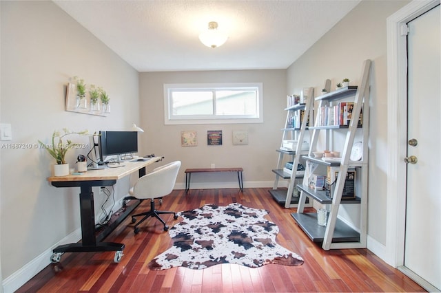 office space with hardwood / wood-style flooring