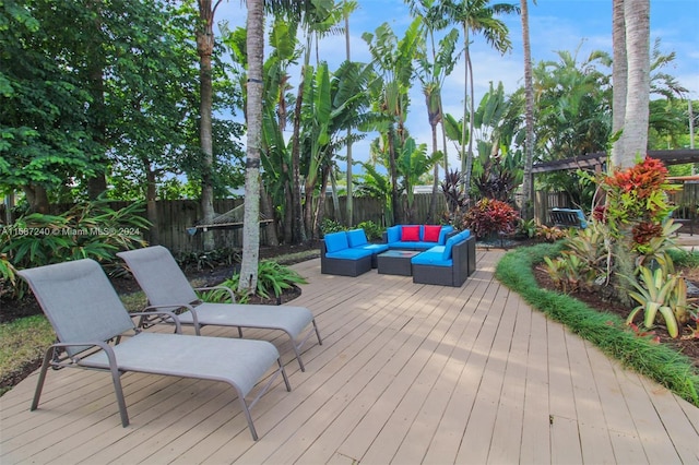 wooden terrace featuring an outdoor hangout area