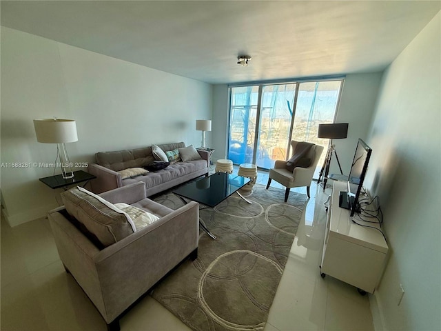 living room featuring floor to ceiling windows