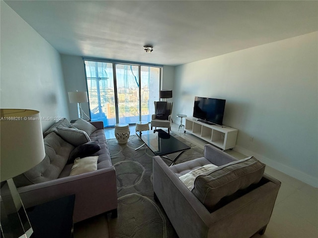 living room featuring a wall of windows