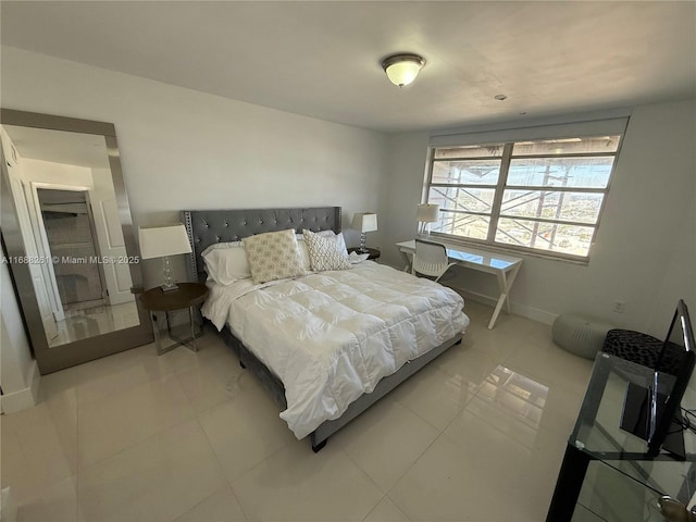 bedroom with tile patterned flooring