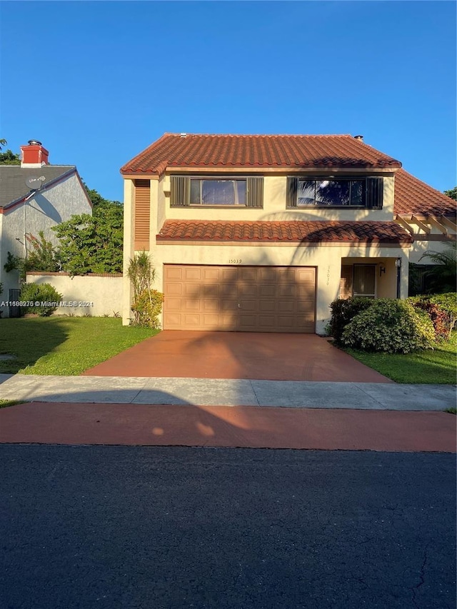 view of front of home with a garage