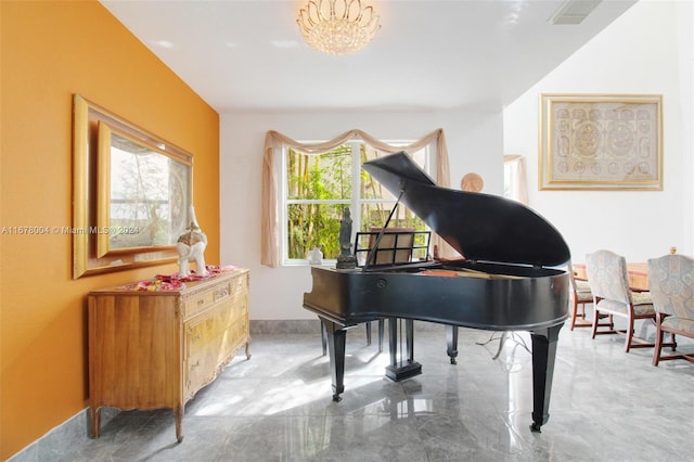 living area with an inviting chandelier and visible vents