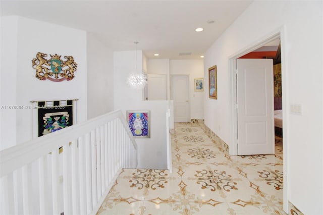 6641 SW 166th Ct, Miami, FL 33193 - hallway featuring an upstairs landing, recessed lighting, and a chandelier