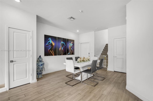 dining room with light wood-type flooring