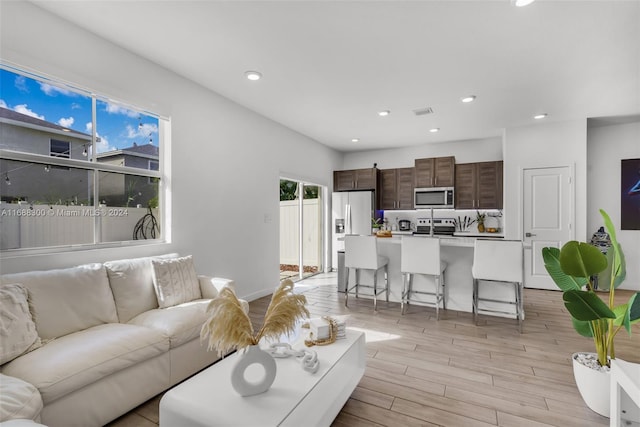 living room featuring light hardwood / wood-style flooring