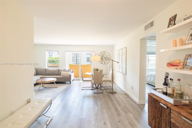 living room with light hardwood / wood-style floors