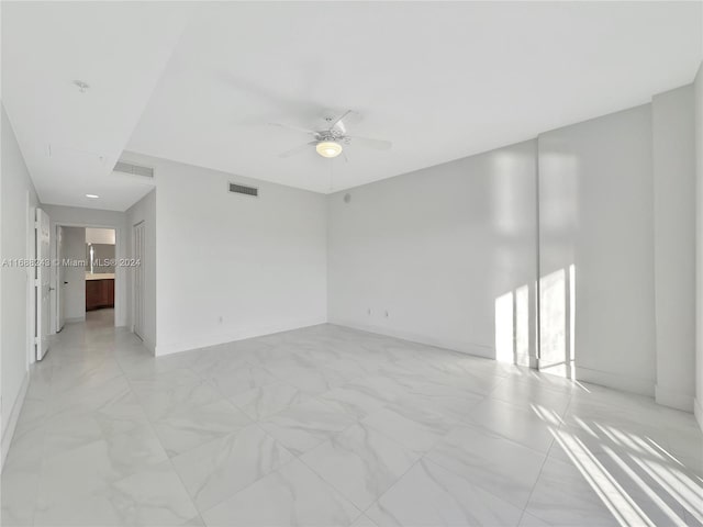 spare room featuring ceiling fan