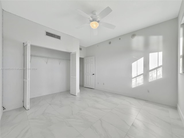 unfurnished bedroom with a closet and ceiling fan