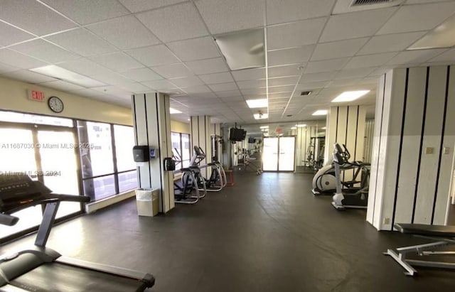 workout area with a drop ceiling