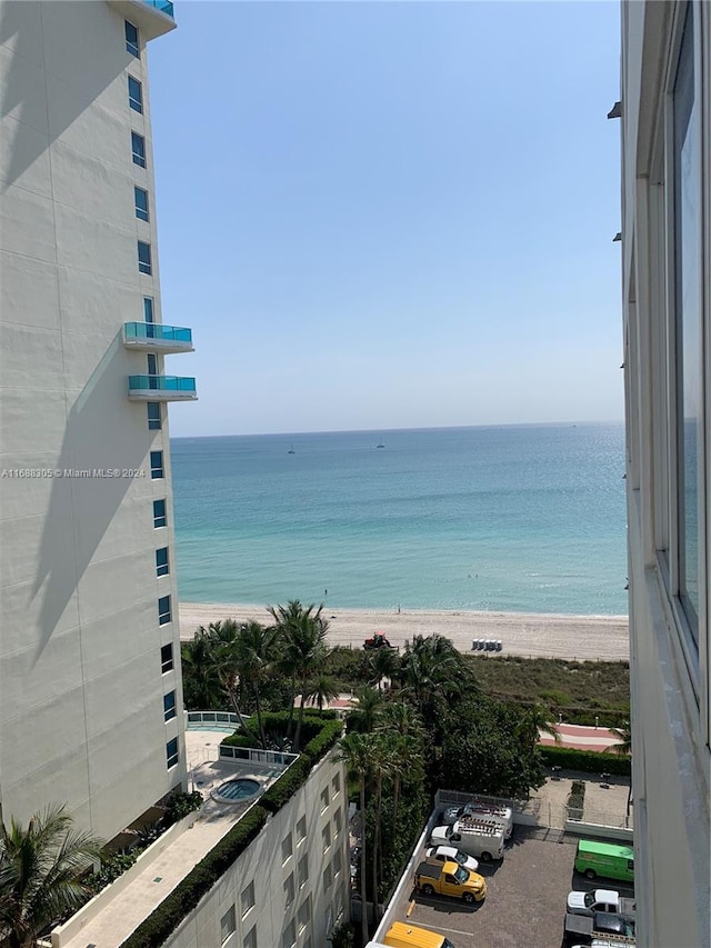 view of water feature with a beach view