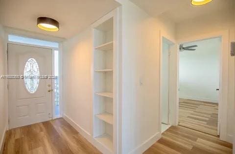 foyer entrance featuring hardwood / wood-style flooring