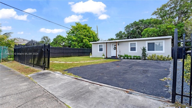 view of front of home with a front lawn