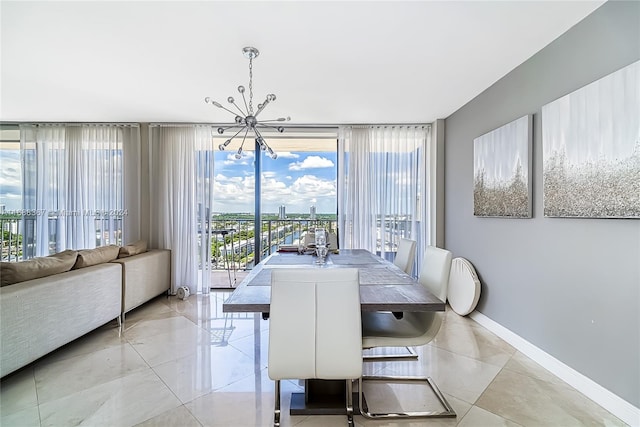 dining room with a wealth of natural light and an inviting chandelier