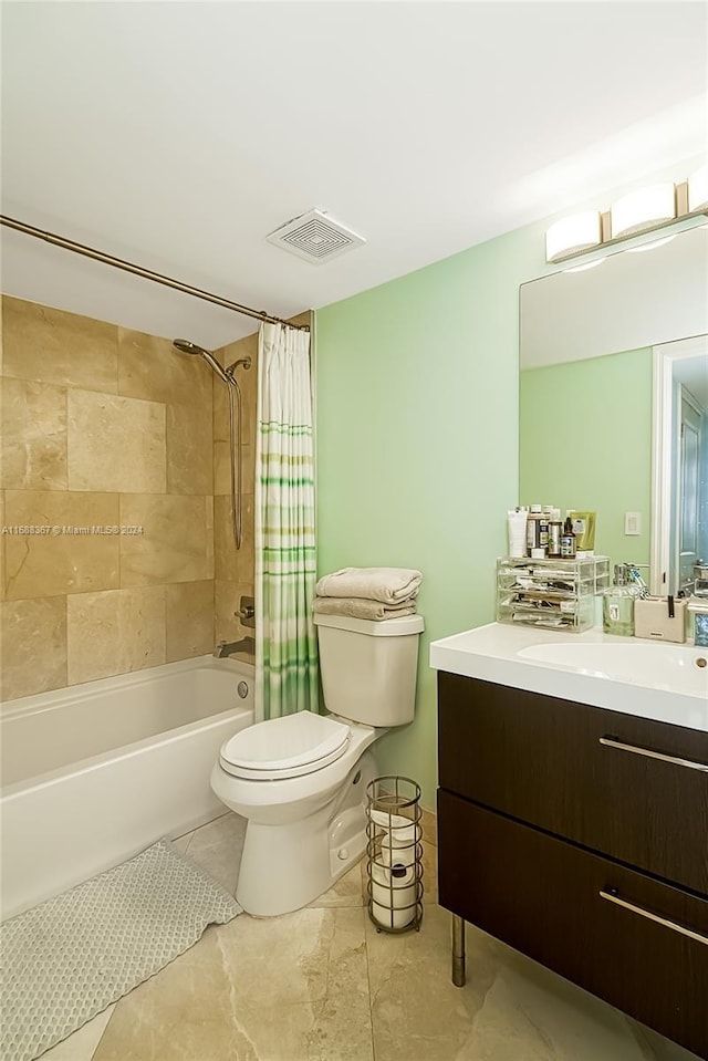 full bathroom with vanity, toilet, and shower / tub combo