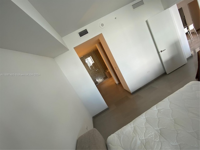 hallway featuring hardwood / wood-style floors