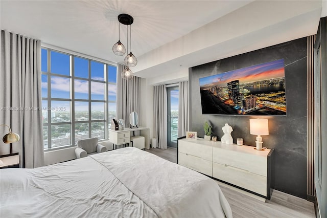 bedroom featuring hardwood / wood-style floors