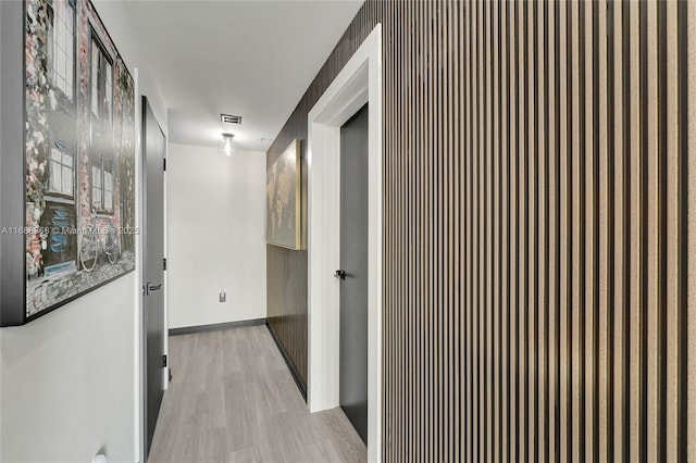 hallway featuring light hardwood / wood-style floors