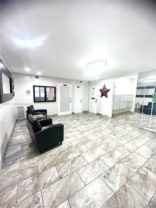 1811 Jefferson St Unit 210, Hollywood, FL 33020 - building lobby featuring a textured ceiling