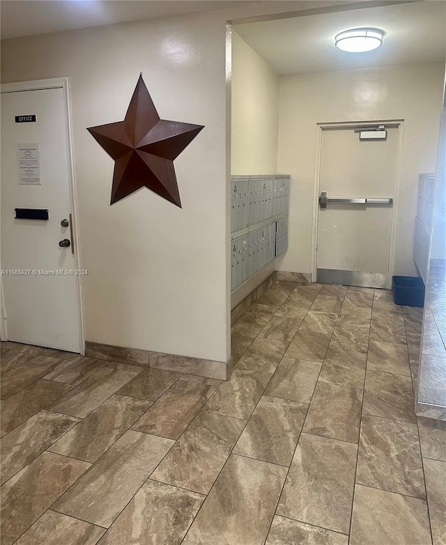 bathroom with mail boxes