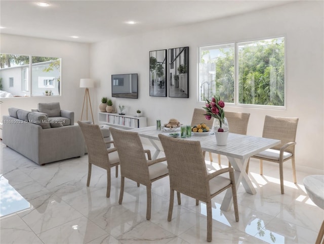 dining area with a healthy amount of sunlight