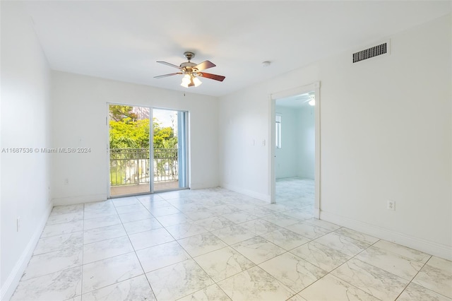 spare room featuring ceiling fan