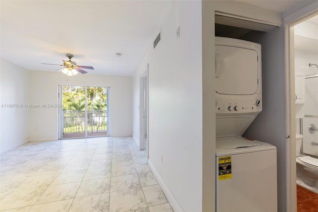 washroom with ceiling fan and stacked washer and clothes dryer