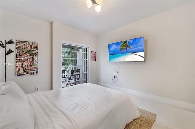 bedroom featuring light tile patterned floors