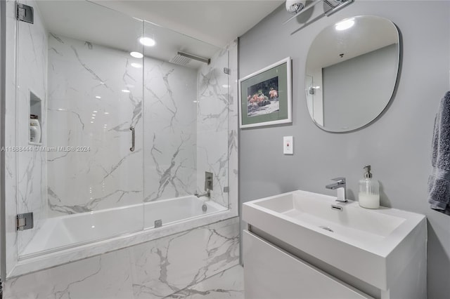 bathroom with vanity and tiled shower / bath combo