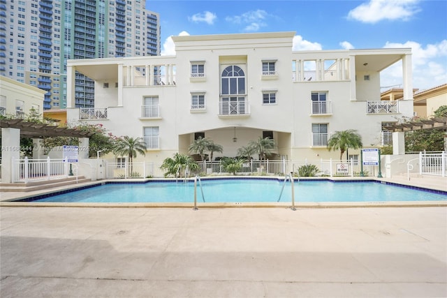 view of pool with a pergola