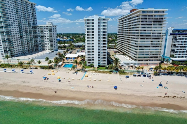 drone / aerial view with a view of the beach and a water view